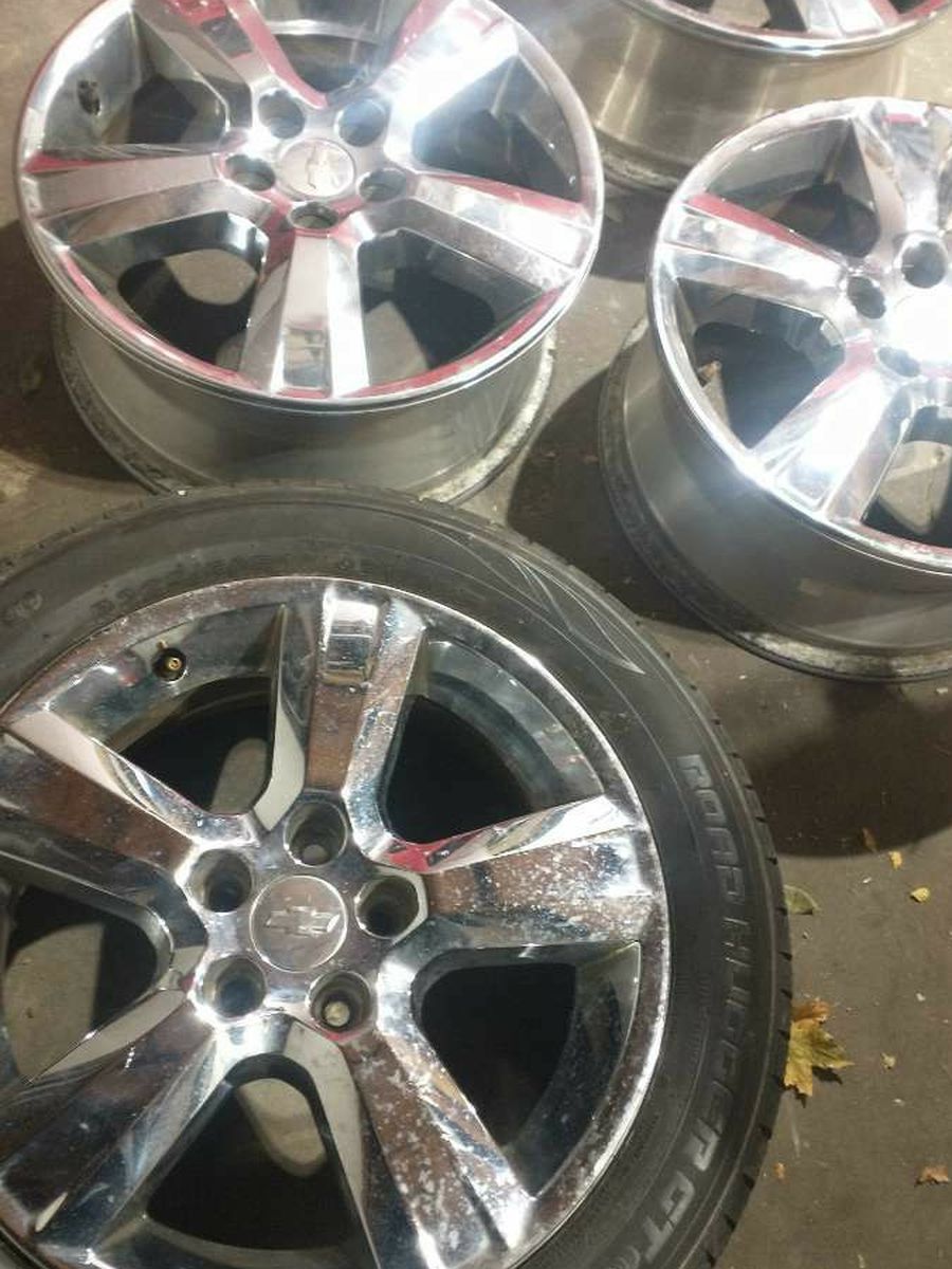 Chevy rims. Comes with single good shape tire.