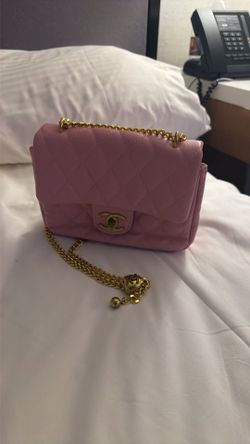Chanel  pink quilting long chain heart locket hardware is beautiful