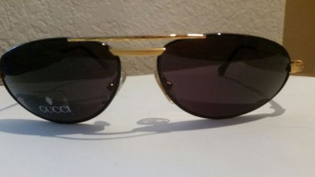 Gucci original black gold sunglasses new.