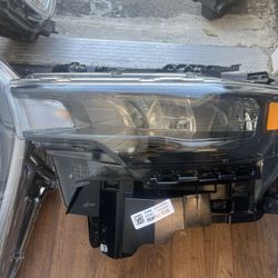2025 DODGE  RAM  LEFT  HEADLIGHT 