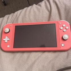 Nintendo Switch Lite In Pink Comes With Animal Crossing