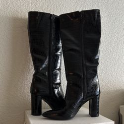 Black thigh high boots