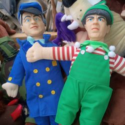 The doll is part of a set of Three Stooges dolls made by the Collins Company in 1982.