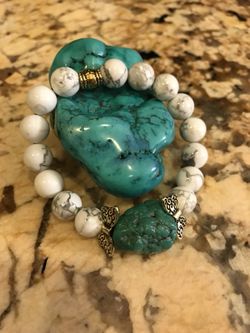 Crystal bracelets $20-25 each. Howlite and Turquoise,Howlite and Amethyst,Opalite,Jet and Amethyst,Zodiac bracelets