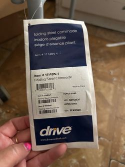 Folding chair commode
