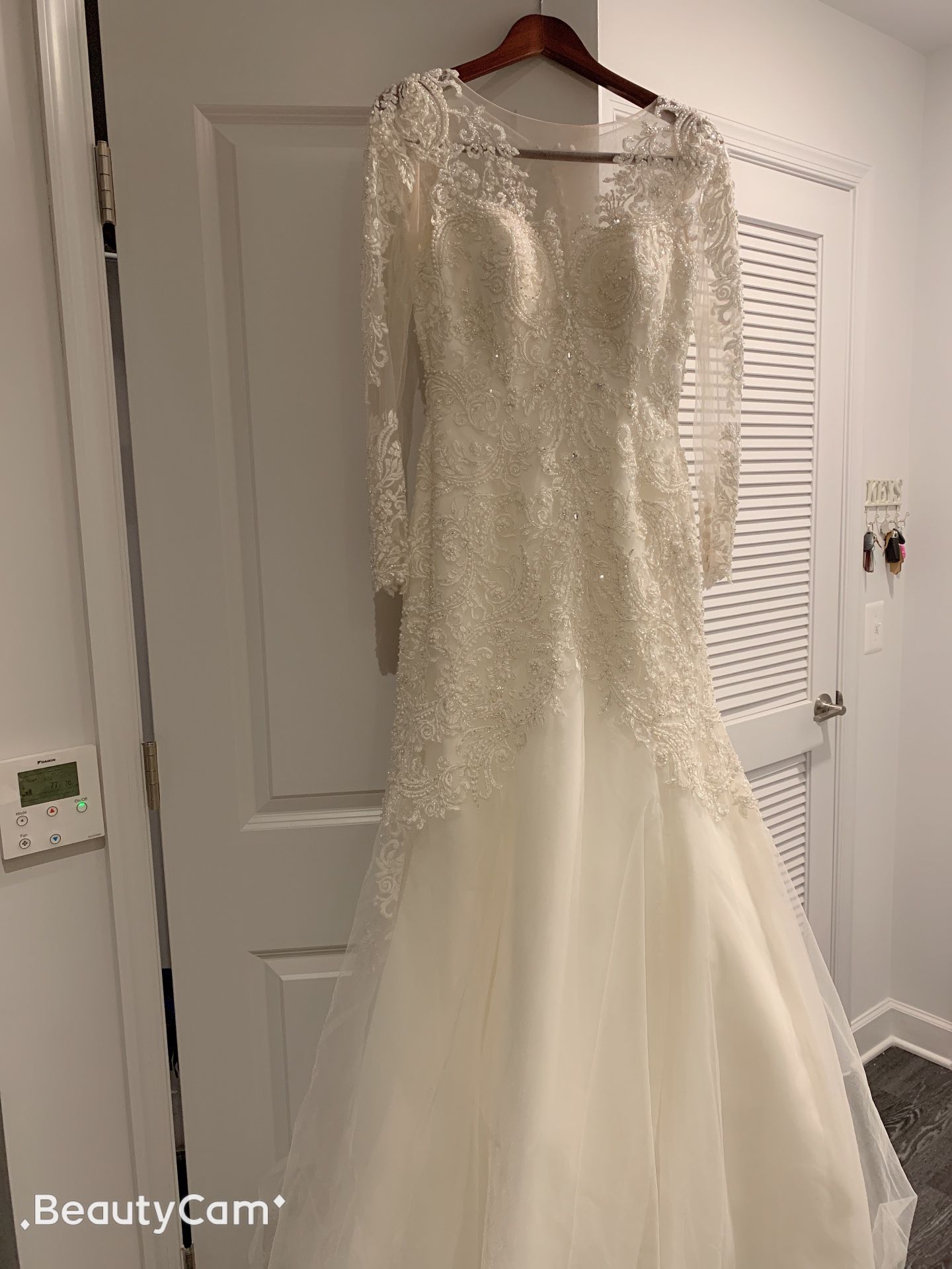 long sleeve Wedding dress Camilla Size 2 tailored to size O $1500 dollars originally