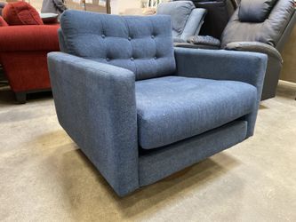 JOYBIRD Eliot Swivel Chair in Faithful Indigo with Tufted Backrest and Wooden Base