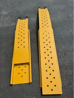 Folding Loading Ramps. Approximately 7Ft Fully Extended. 600lb Capacity Per Ramp.