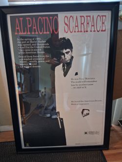 large scarface movie poster in frame