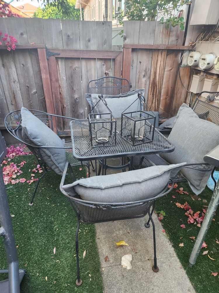 UPDATE!! 5 PIECE WROUGHT IRON SET PLUS CUSHIONS, LATERNS, AND SATINLESS STEEL WORKTABLE