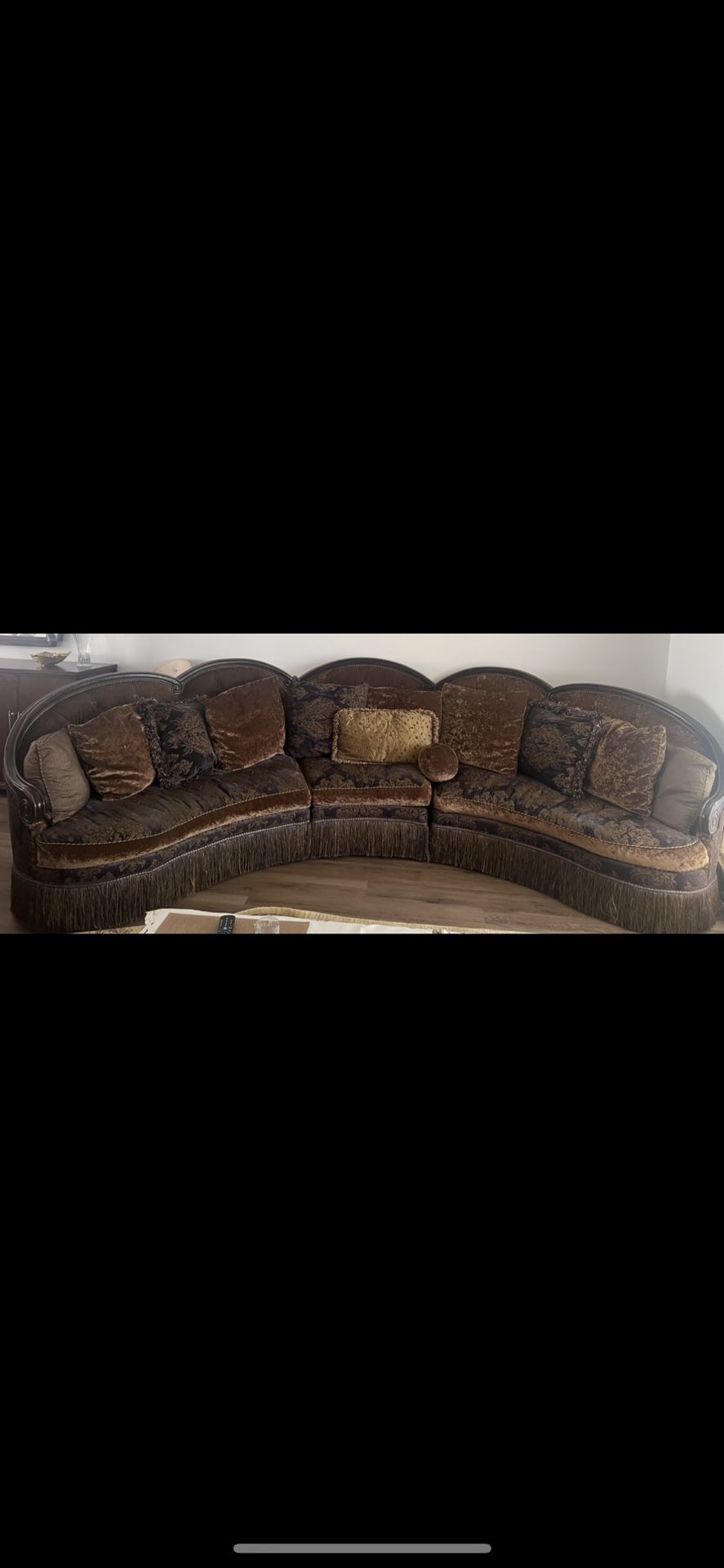 Three-Piece Sectional Sofa With Decorative Seat Back and Fringe Skirt