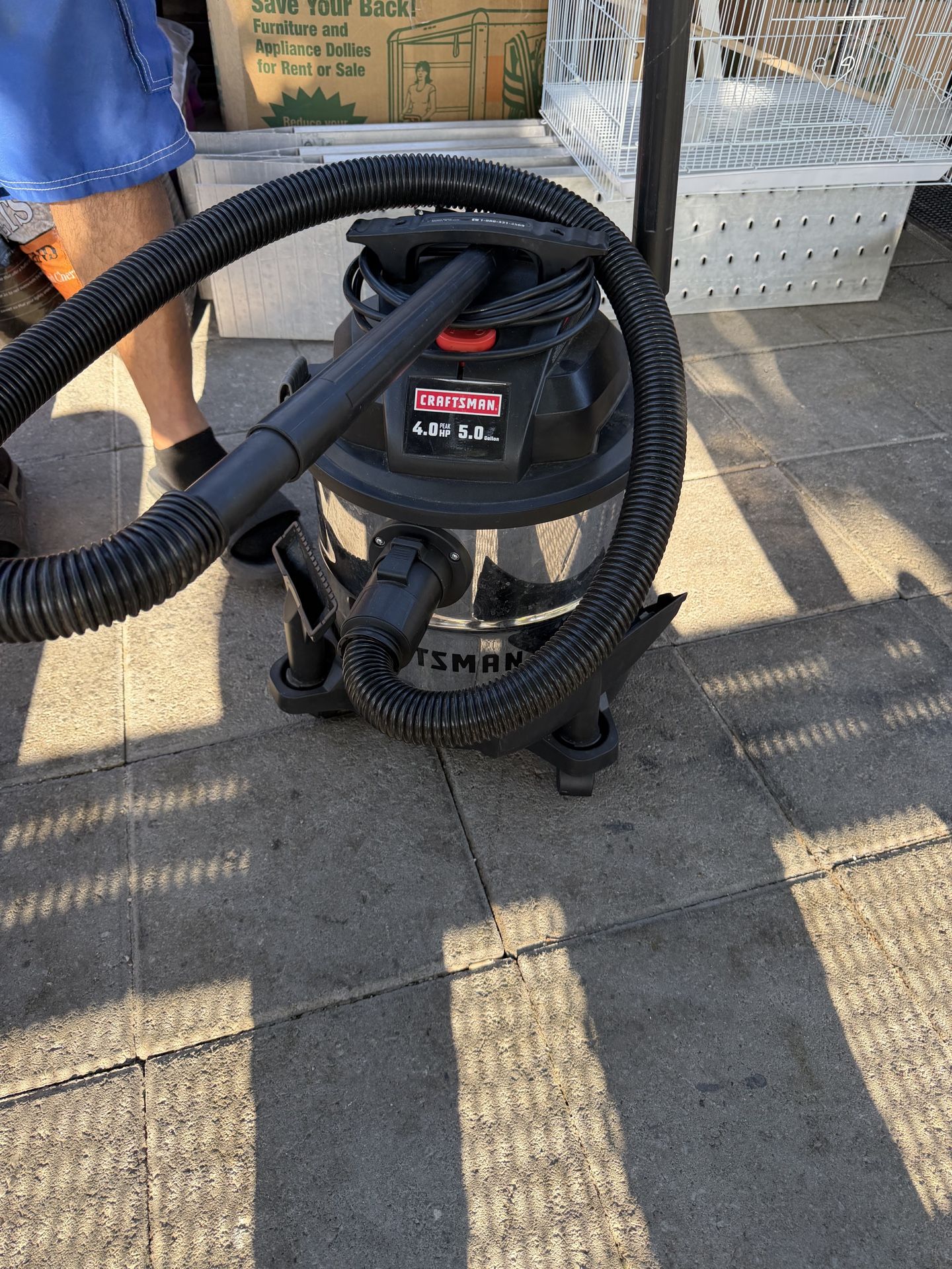 Craftsman 5-Gallon 4-HP corded wet/dry shop vacuum.
