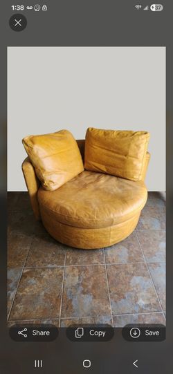 FREE DELIVERY Leather Swivel Cuddle chair