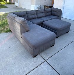Dark Gray Sectional with Ottoman - Ashley’s