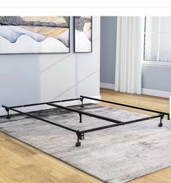 Metal king bed frame on casters