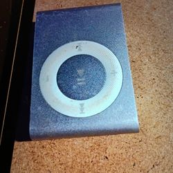 APPLE IPOD SHUFFLE 4TH GENERATION 2GB GRAY MP3 PLAYER. SOLD AS IS