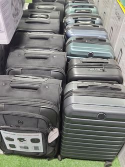 Name brand carryon suitcase for $50 each