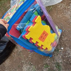Baby Clothes And Floor Toy 