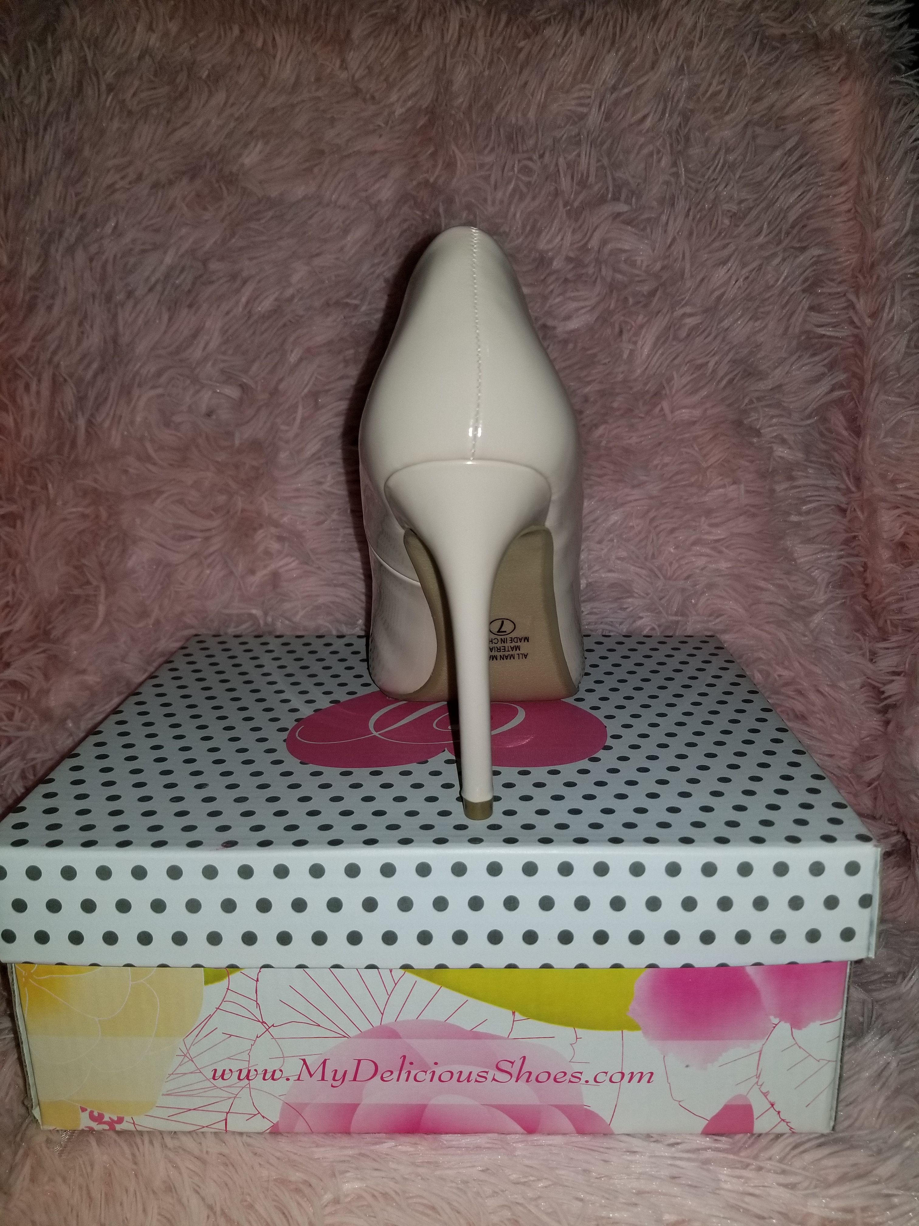 Nude pointed toe heels