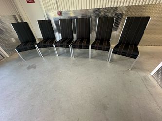 Heavy dinning chairs 6 very comfortable no tear wear no stain