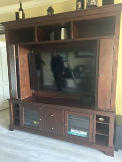 Wooden Entertainment Center With TV