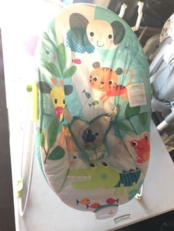 Baby bouncer with vibrator. Silla vibradora para bebe