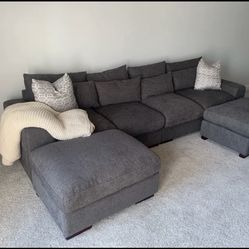 Dark gray sectional with ottoman