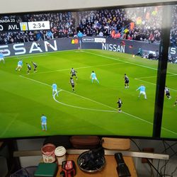 Curved 55" Samsung TV 