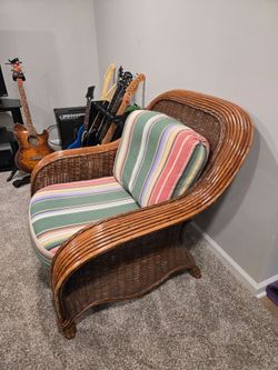 Vintage wicker chair with cushions