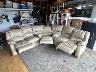 Cream leather sectional with recliners