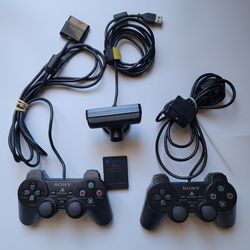 Playstation 2 accessories & two controllers, memory card & camera