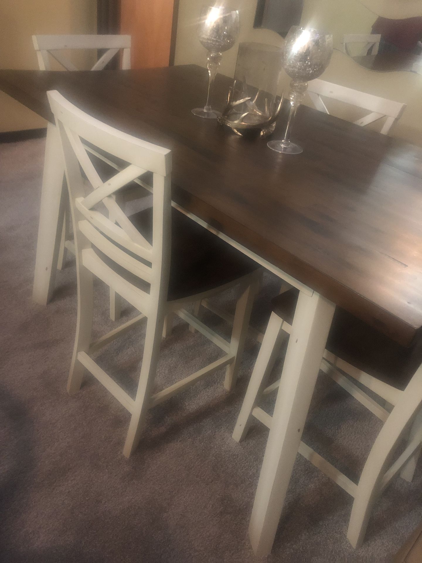 Five piece dining room table 56 in long and 35in wide