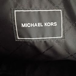 Michael Kors Backpack With One Outside Pocket Which Zipaaswell As Couple Of Pockets Located Inside The Beg. There Are 2 Zippers Which Can Meet On The 