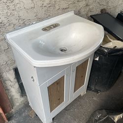 bathroom sink with vanity base  $40