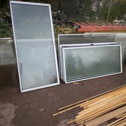 5 dual glazed sliding glass doors out of 6’x6-8 frame glaze is approximately 33.5”x75” take all 5 for $100 cash some seals are still good no broken gl