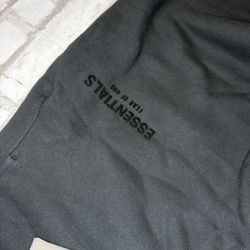 ESSENTIALS BLACK SIZE M UNCUFFED NEW WITH TAG AND BAG