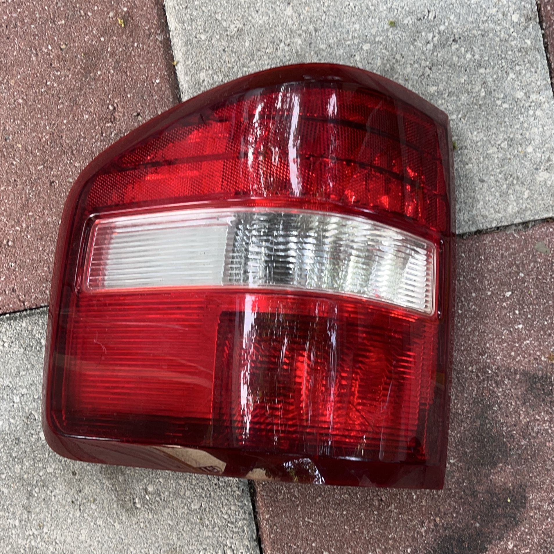 Red and White Car Tail Light Assembly