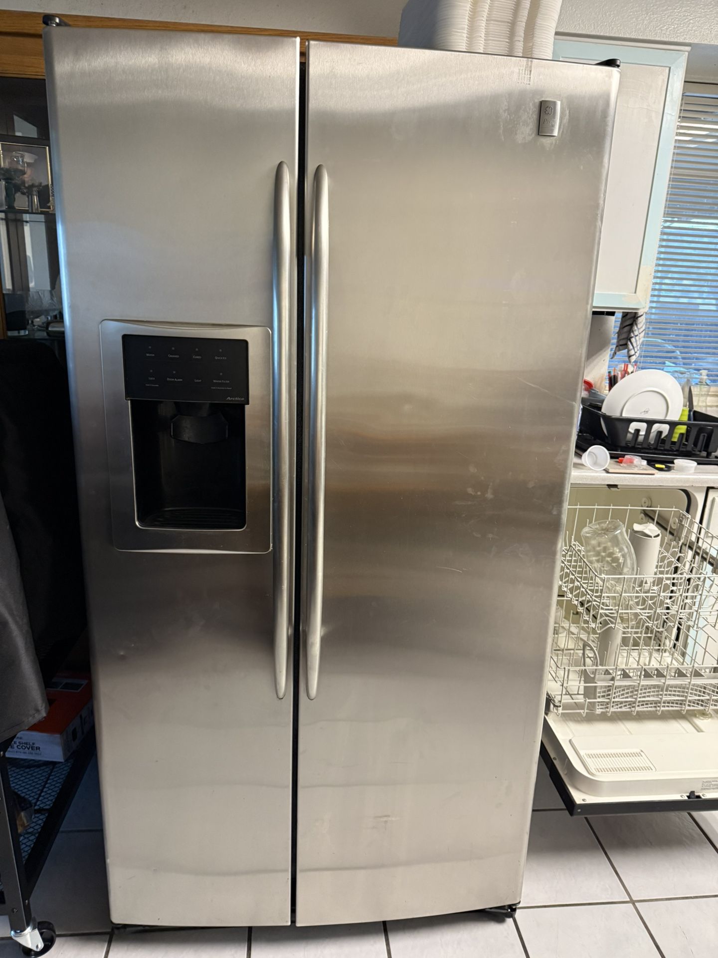 GE Stainless Side-by-Side Refrigerator with Dispenser 