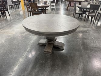 Round Pedestal Table