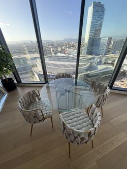 Gray Woven Dining Chairs with Gold Frames