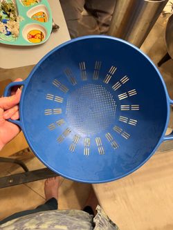 Blue colander strainer