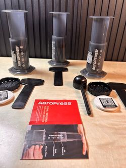 3 AeroPress coffee makers total (two new units and one used unit).