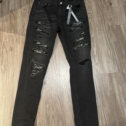 1:1 Amiri Skinny Jeans