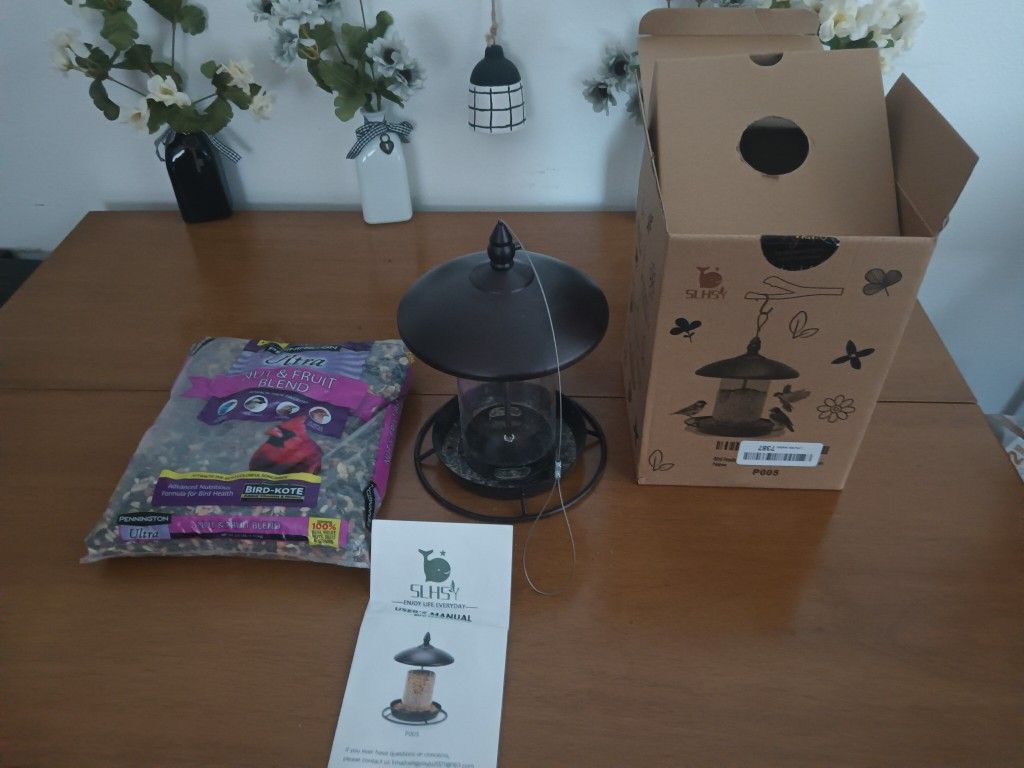 Bird feeder W/ New Food