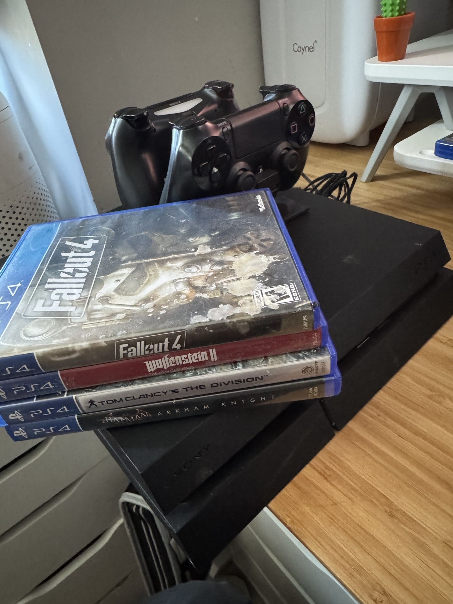 PS4 W/ Games, 2 Controllers And Charging Dock