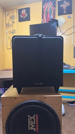 black cube-style powered subwoofer