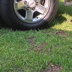 16inch GMC factory wheels and tires