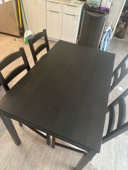 Wooden Table with chairs