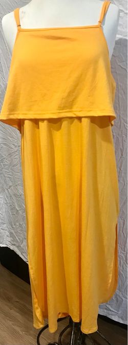 Woman’s lg yellow slit on sides dress