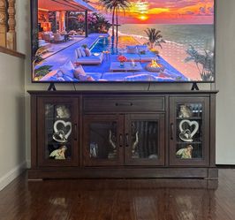 This TV stand is for 65-inch TV.